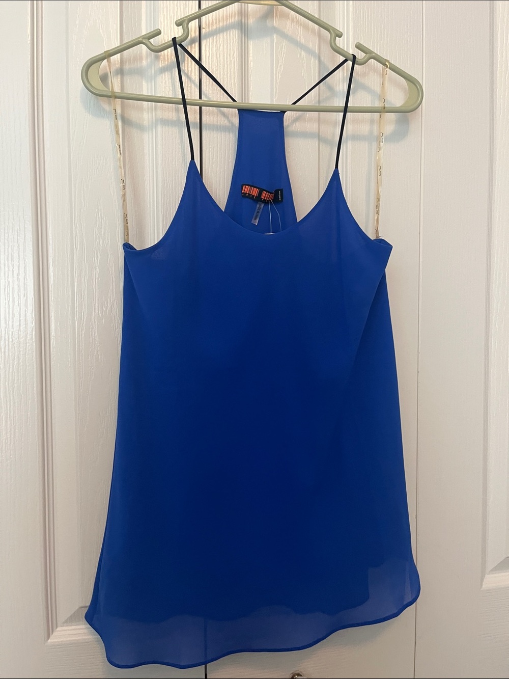 NWT royal blue tank with black straps. Size medium